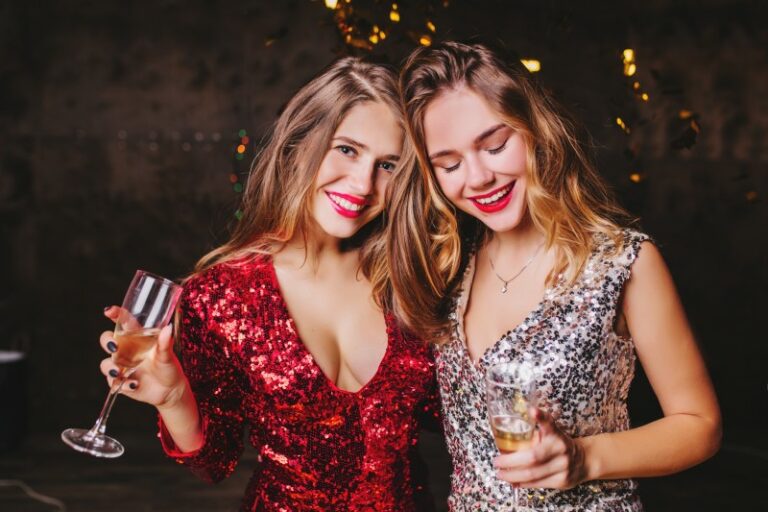 indoor-portrait-pleased-woman-trendy-sparkle-attire-enjoying-christmas-party-with-best-friend (1)